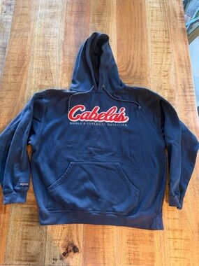 Vintage Cabela's Navy Blue Hoodie with Red Script Logo
